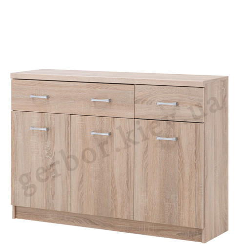 На фото вид сбоку комода KOM 3D2S TOP-MIX VMV Holding дуб сонома